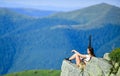 Military female. Woman military outfit hold weapon highlands background. Observing point. Army forces. Brave girl Royalty Free Stock Photo