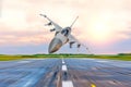 Military fighter jet flies at high speed over the taxiway at the airport. Royalty Free Stock Photo