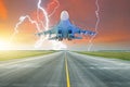 Military fighter jet flies taxiway at the airport. Lightning strike on sunset thunderstorm.