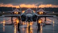 Military Fighter Jets Ready for Takeoff at Dusk Royalty Free Stock Photo