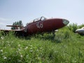 Military fighter plane old abandoned broken. Military abandoned equipment Royalty Free Stock Photo