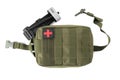 Military first aid kit and tourniquet on white background, top view Royalty Free Stock Photo