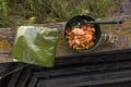 Military food in rhetorical packages. Beans with meat in a bowl. Royalty Free Stock Photo