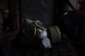 Military Gas Mask in dark ambient. Coronavirus, Covid19 pandemic prevention. Toxic, biohazard and infection danger