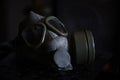 Military Gas Mask in dark ambient. Coronavirus, Covid19 pandemic prevention. Toxic, biohazard and infection danger