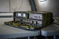 Military grade ruggedized ethernet network switch on a desk in army tent, closeup detail Royalty Free Stock Photo