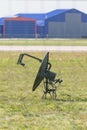 A military green radar on the field - side view