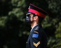 Military guard with protective face mask at the Canadian War Memorial in Ottawa