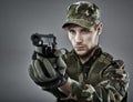 Military guy shooting Royalty Free Stock Photo