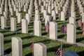 Military Headstones Decorated with Flags for Memorial Day Royalty Free Stock Photo