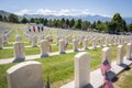 Military Headstones Decorated with American Flags on Memorial Day Royalty Free Stock Photo
