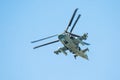 Military helicopter flies in the sky