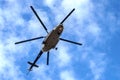 Military Helicopter flying on blue sky Royalty Free Stock Photo