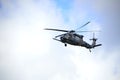 Military helicopter on blue sky Royalty Free Stock Photo