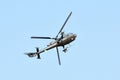 Military helicopter flying on side