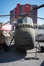 Military helicopter parked on a vacant lot in an urban area Royalty Free Stock Photo