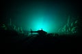 Military helicopter ready to fly from conflict zone or Silhouettes of a large crowd of people trying to escape with helicopter. De Royalty Free Stock Photo