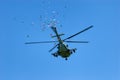 Military helicopter throws festive flyers