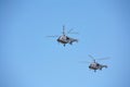 Two military helicopters against the blue sky. Royalty Free Stock Photo