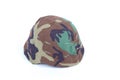Military helmet in woodland camo