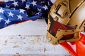 Military helmets and American flag on Veterans or Memorial day Royalty Free Stock Photo