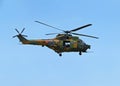 Military IAR-330 Puma Socat helicopter performing a demonstration flight