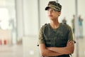 Military, idea and arms crossed with a woman soldier in uniform for safety, service or patriotism Army, thinking and a Royalty Free Stock Photo