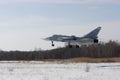 Military jet bomber Su-24 Fencer flying Royalty Free Stock Photo