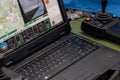 A military laptop with a drone flight control interface and parameter monitoring Royalty Free Stock Photo