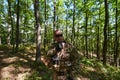 A military major employs a Motorola radio for seamless communication with his fellow soldiers during a tactical