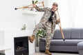 military man with crutches, disability