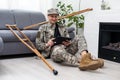 military man on crutches with tablet doctor