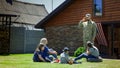 Military man with family in backyard