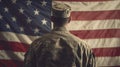 Military man holding Flag of the United States. Royalty Free Stock Photo