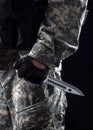 Military man with a knife in a hand close up Royalty Free Stock Photo