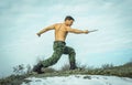 Military man training martial arts in nature Royalty Free Stock Photo