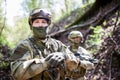 Military men in helmet and camouflage Royalty Free Stock Photo