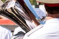 Military musician playing big tuba on parade Royalty Free Stock Photo