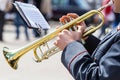 Military musician playing on gold trumpet in army orchestra Royalty Free Stock Photo