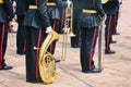 Military musicians on parade with wind instruments in their hands - trombone, tuba, trumpet, saxophone Royalty Free Stock Photo