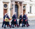 Military musicians soldiers marching to the entrance of the Pra