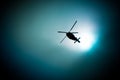 Military navy helicopter flying in the dark sky Royalty Free Stock Photo