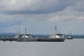 Military Navy Patrol Boat is mooring at Marine Dock. Royalty Free Stock Photo