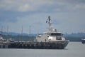 Military Navy Patrol Boat is mooring at Marine Dock. Royalty Free Stock Photo