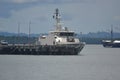 Military Navy Patrol Boat is mooring at Marine Dock. Royalty Free Stock Photo