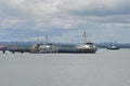 Military Navy Patrol Boat is mooring at Marine Dock. Royalty Free Stock Photo