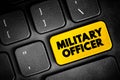 Military Officer text button on keyboard, concept background