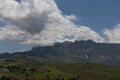 Military parachuters being airdropped over Seiser Alm in the Dolomites, Northern Italy Royalty Free Stock Photo