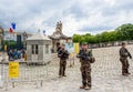 Military patrol, keeping the order, near Main entrance of Versailes