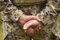 Military person holding hands behind his back Royalty Free Stock Photo